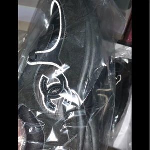 Black reflective Chanel trainer sneakers